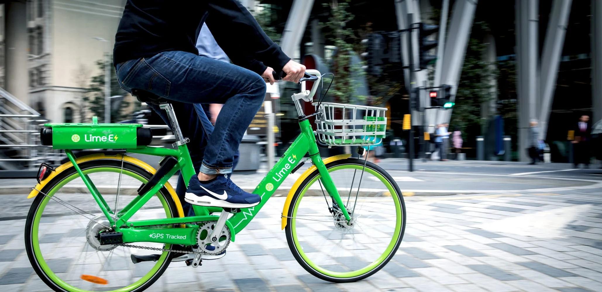 Man riding original UK lime bike